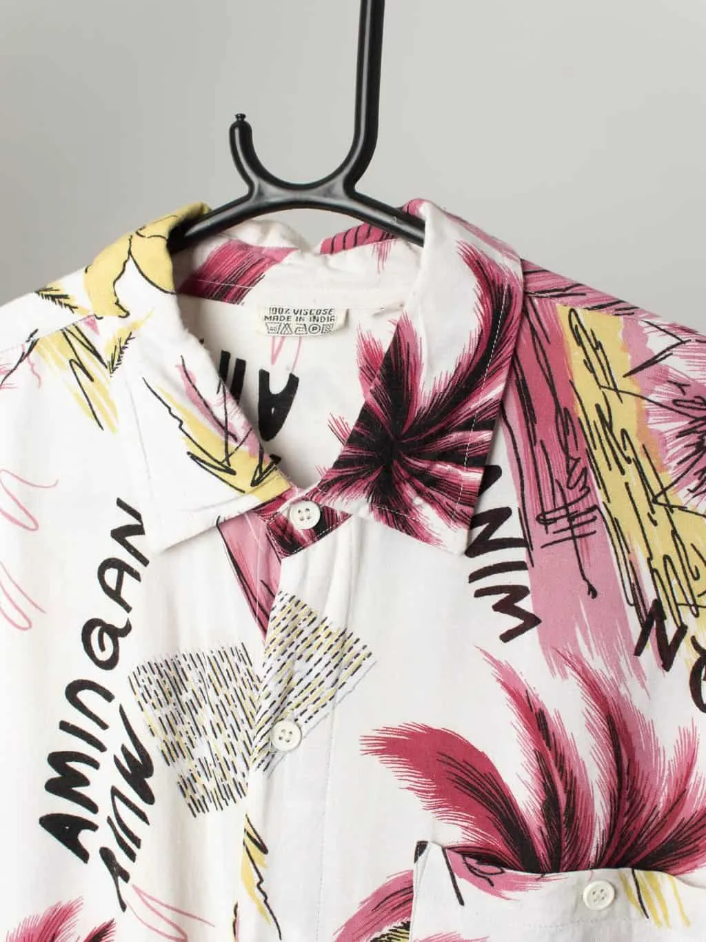 Vintage 90s Hawaiian shirt in white with bold pink and yellow floral palm tree design – XL